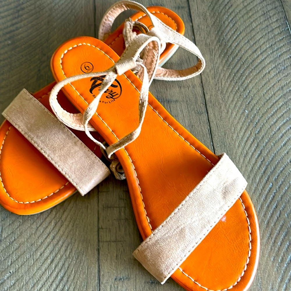 Trary brand new women’s tan flat sandals with ankle lace up straps!